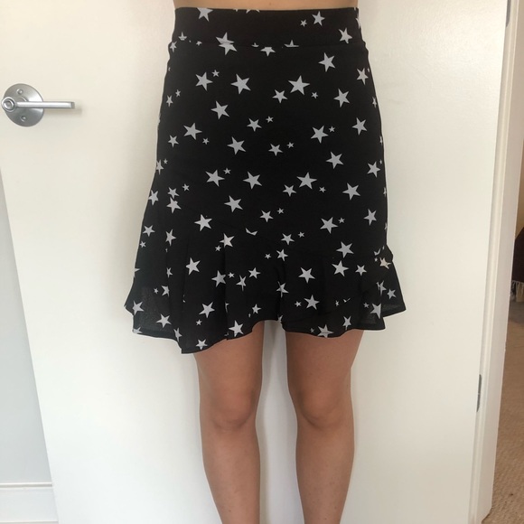 Mini black flare skirt with stars - Picture 4 of 6